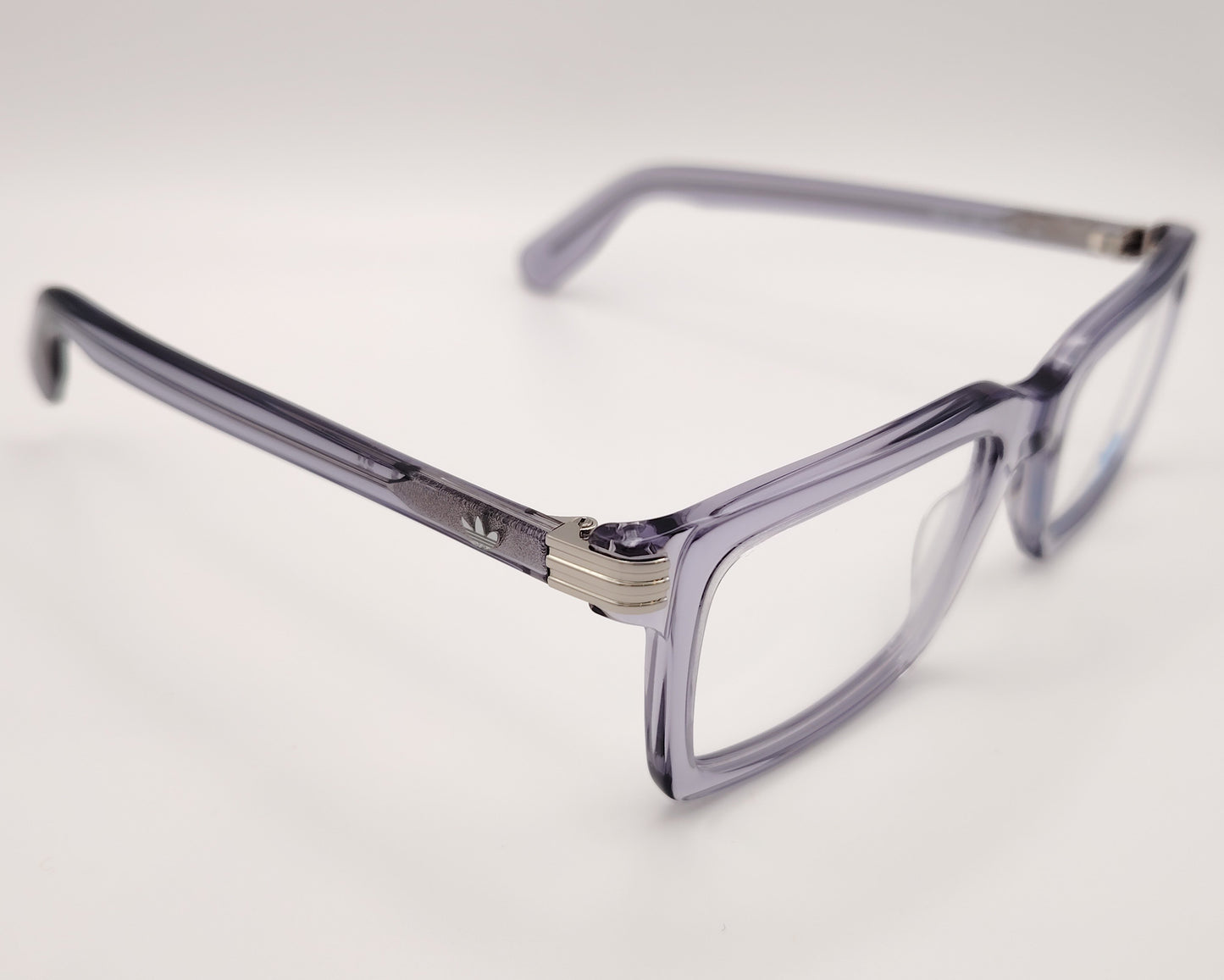 gafas de vista adidas or5115 con montura de acetato en gris translúcido y detalle metático en el talón