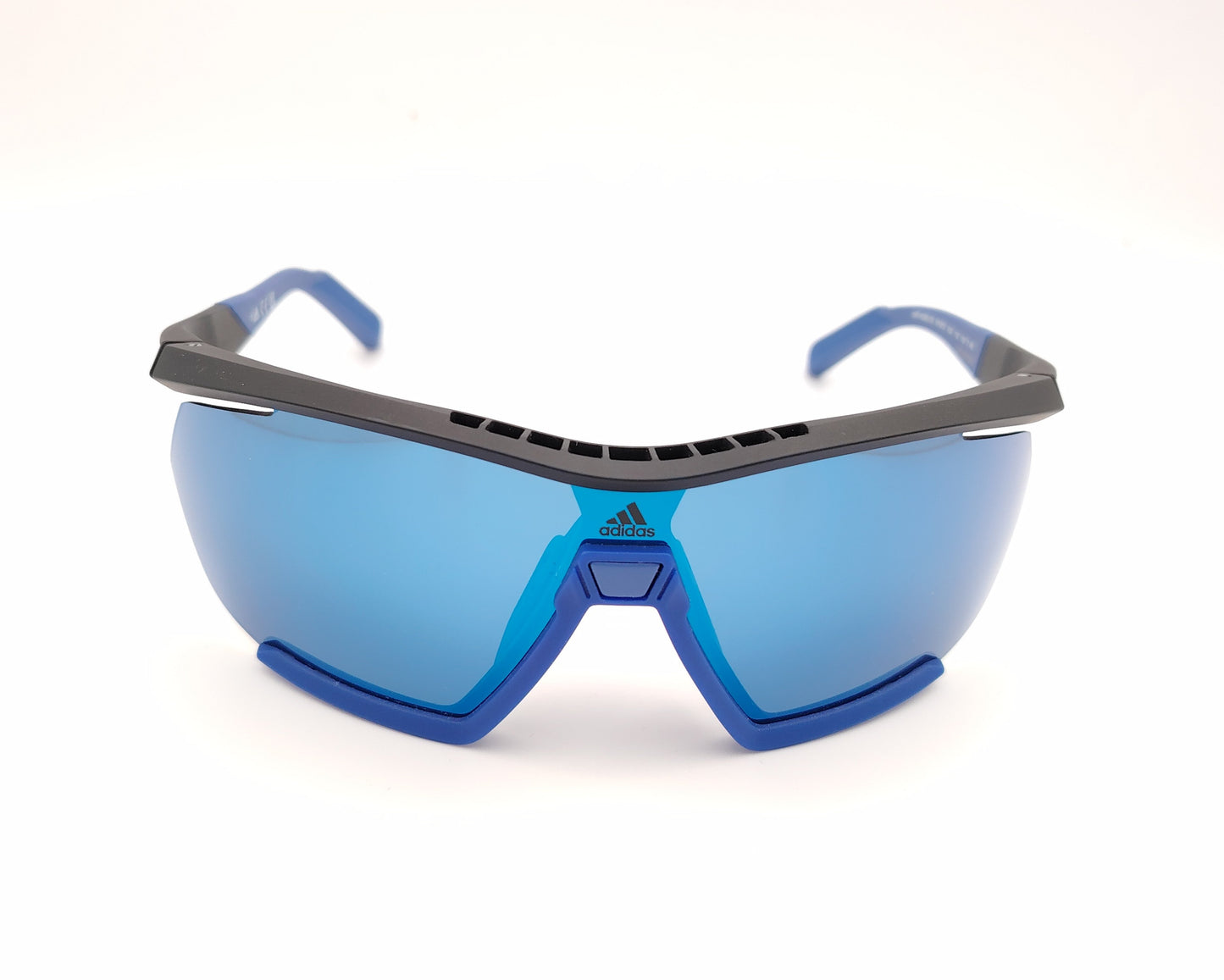 adidas sp0072 05x gafas de sol de de estilo deportivo, pantalla semi al aire, con pasta negra mate en la parte superior y azul mate en la inferior, lentes de espejo azul