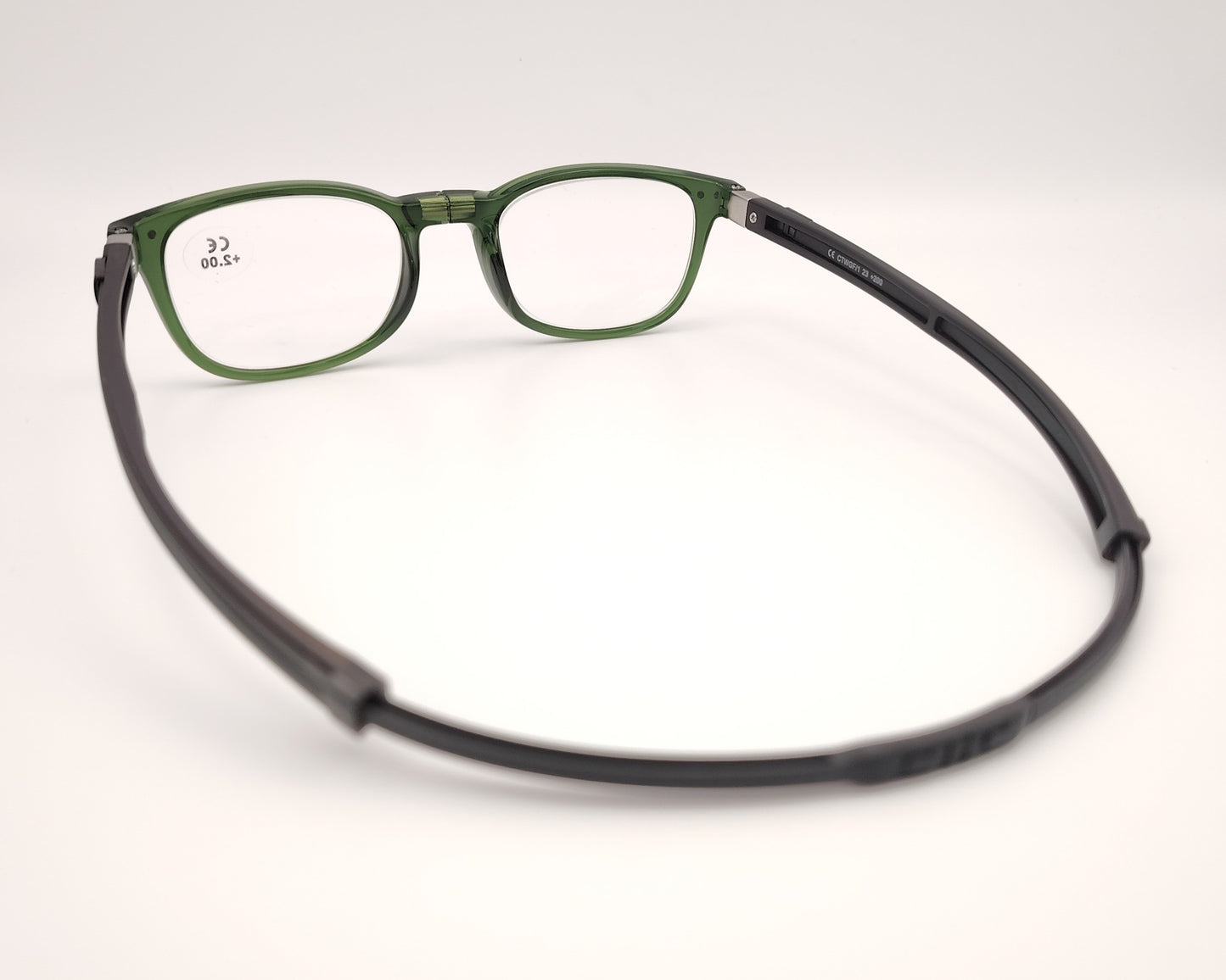 gafas clic de lectura con montura verde translúcida, varillas negras y sistema magnético frontal para cierre y apertura
