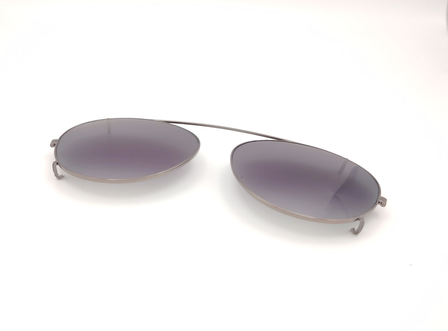 clip solar marc o´polo de metal plateado con lentes grises degradadas