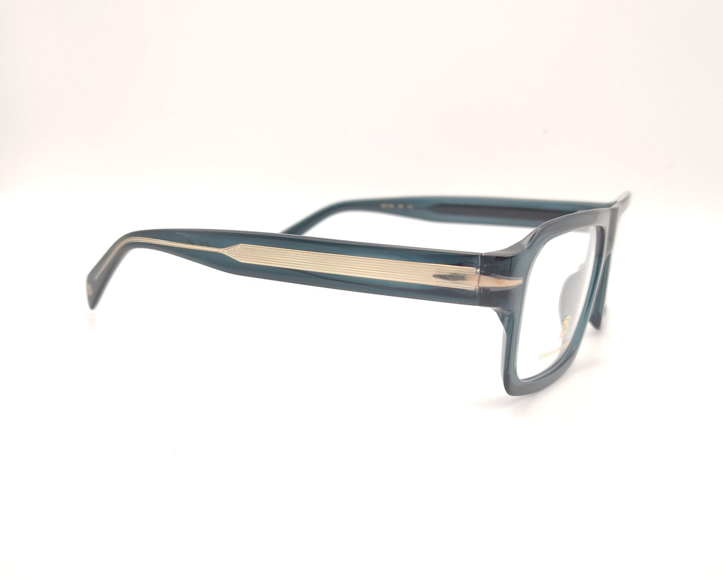gafas graduadas rectangulares de acetato azul petróleo translúcido con detalle metálico en las varillas