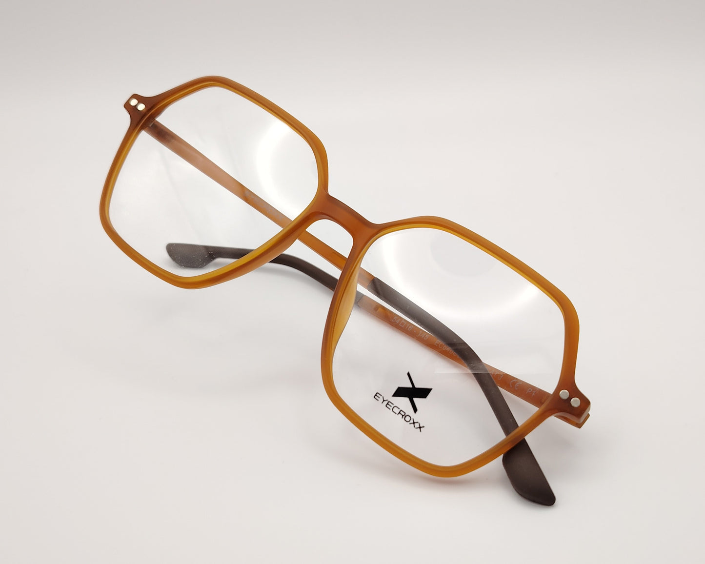 gafas eyecroxx ec646ud c3 montura geométrica extra ligera, color mostaza mate con clip solar magnético polarizado