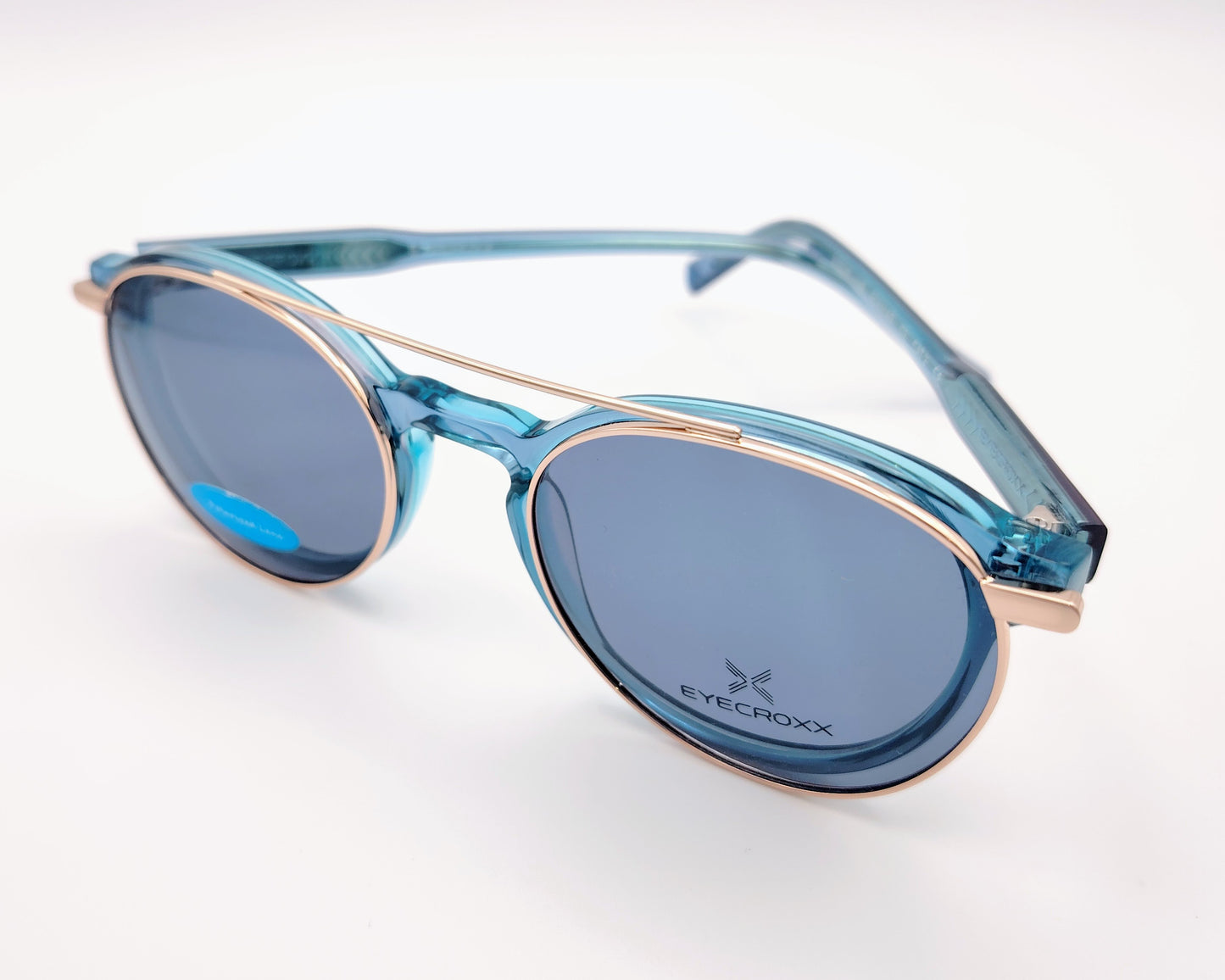 gafas eyecroxx ec621 c3 montura geométrica redonda color azul con clip solar magnético metálico polarizado
