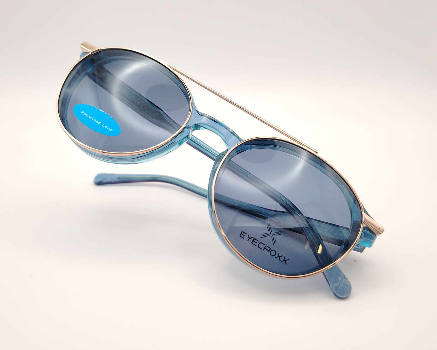gafas eyecroxx ec621 c3 montura geométrica redonda color azul con clip solar magnético metálico polarizado