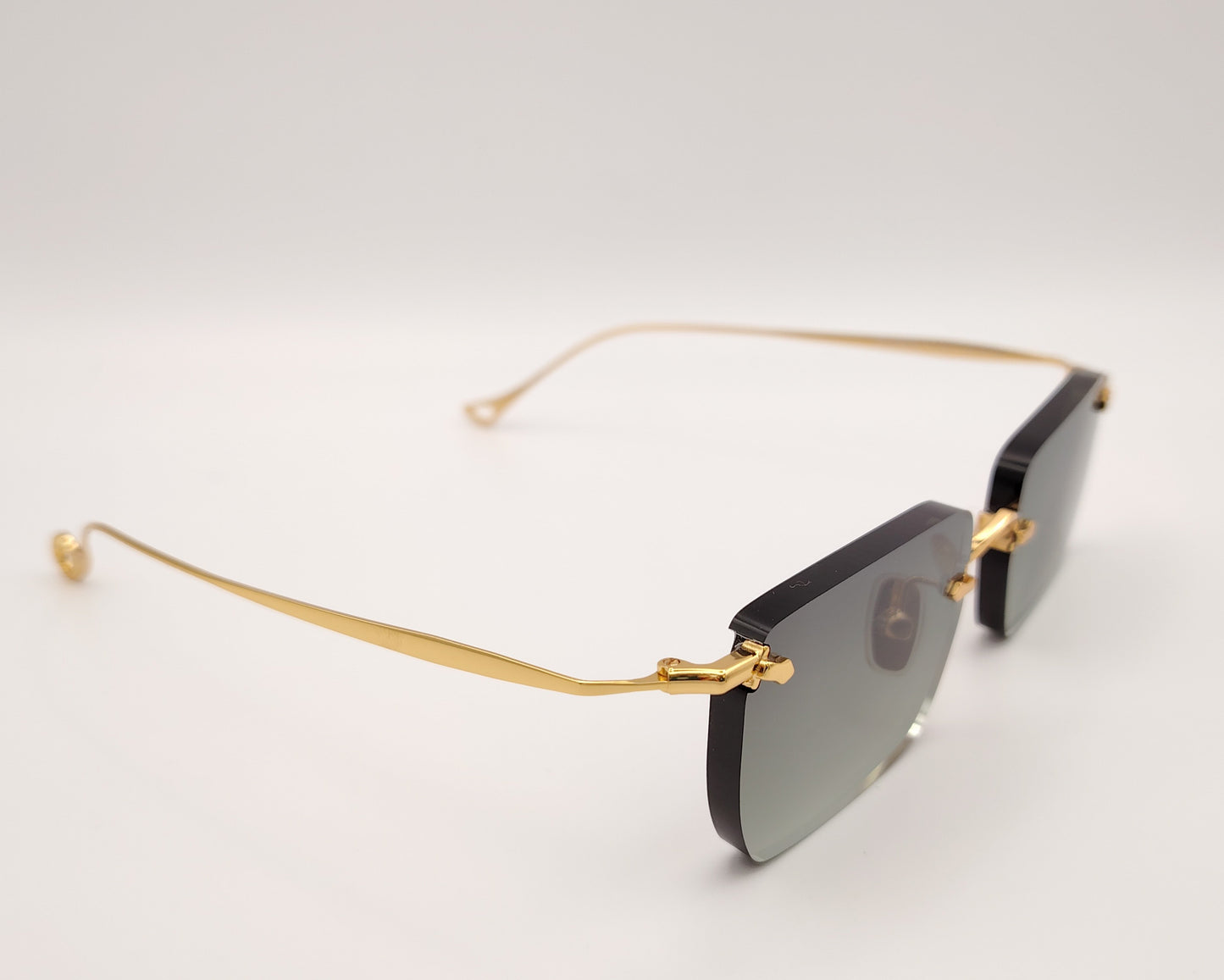 eyepetizer etherege c4-52 gafas de sol sin montura con lentes rectangulares degradadas en verde y detalles dorados