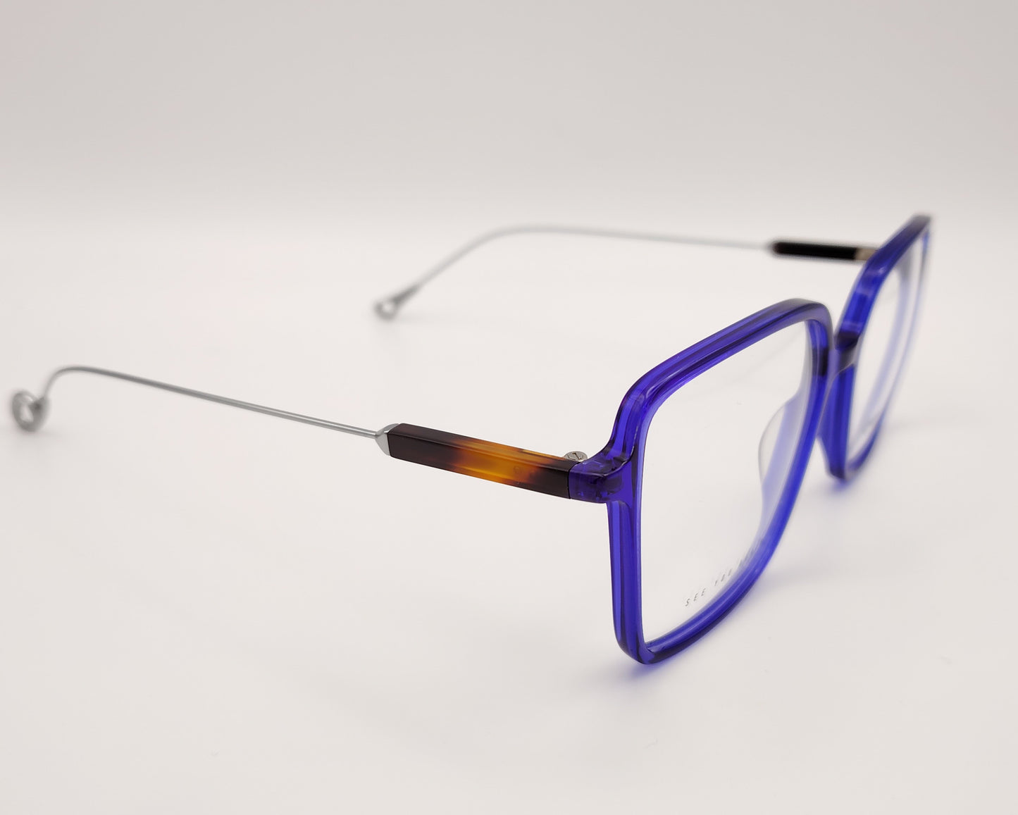 eyepetizer quovadis c vlt gafas graduadas con montura azul translúcida y varillas metálicas diseño cuadrado moderno y ligero
