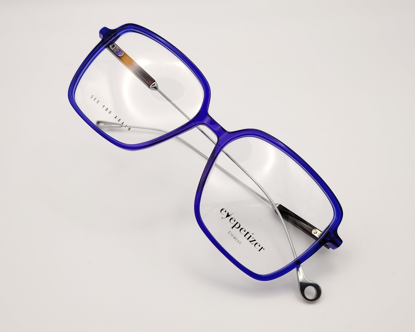 eyepetizer quovadis c vlt gafas graduadas con montura azul translúcida y varillas metálicas diseño cuadrado moderno y ligero