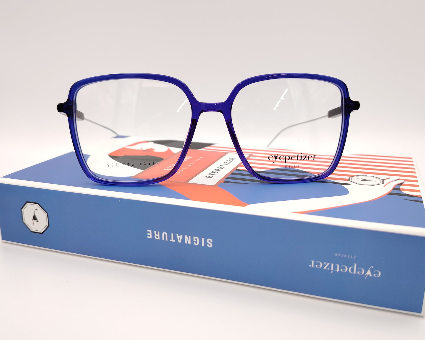 eyepetizer quovadis c vlt gafas graduadas con montura azul translúcida y varillas metálicas diseño cuadrado moderno y ligero