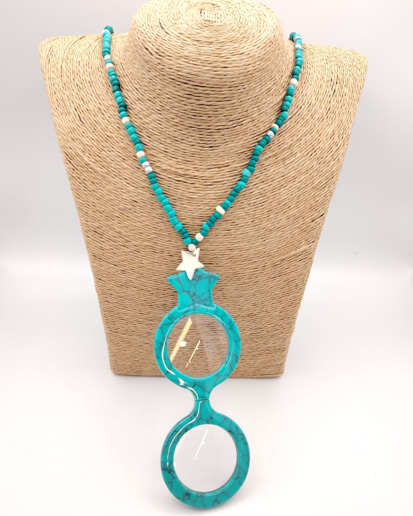 lupa flippan look fl00463c estrella turquesa colgante en color azul turquesa con abalolio de estrella beig y collar de bolas a juego
