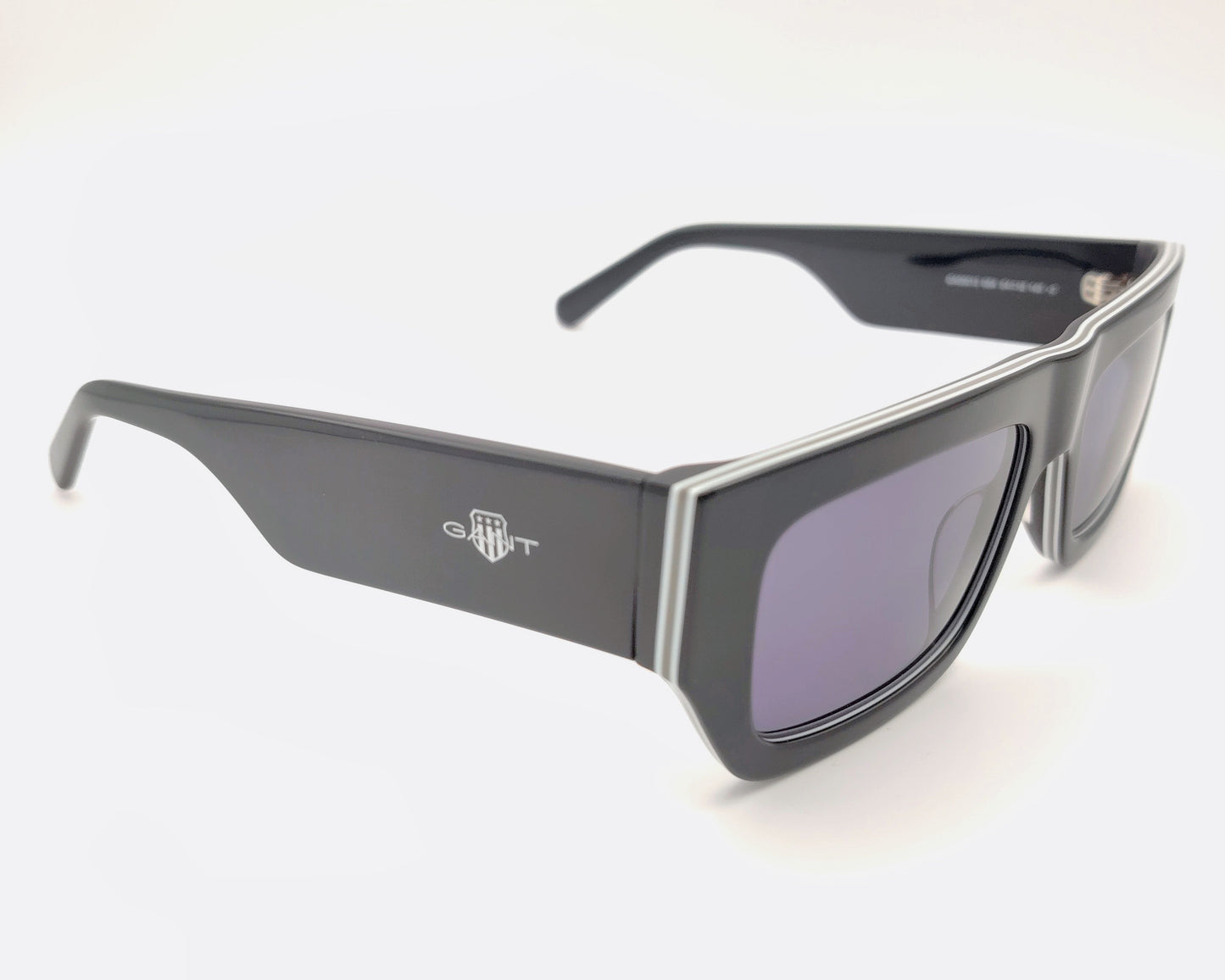 gant ga00013 05a gafas de sol con montura rectangular en acetato negro con detalles en blanco y lentes ahumadas para un look urbano y moderno