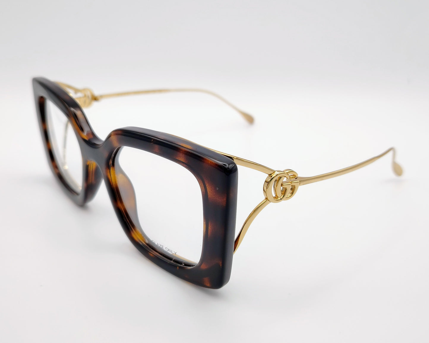 gucci gg1567o 002 gafas de pasta de forma cuadrada en color habana con varillas metálicas con logo gg