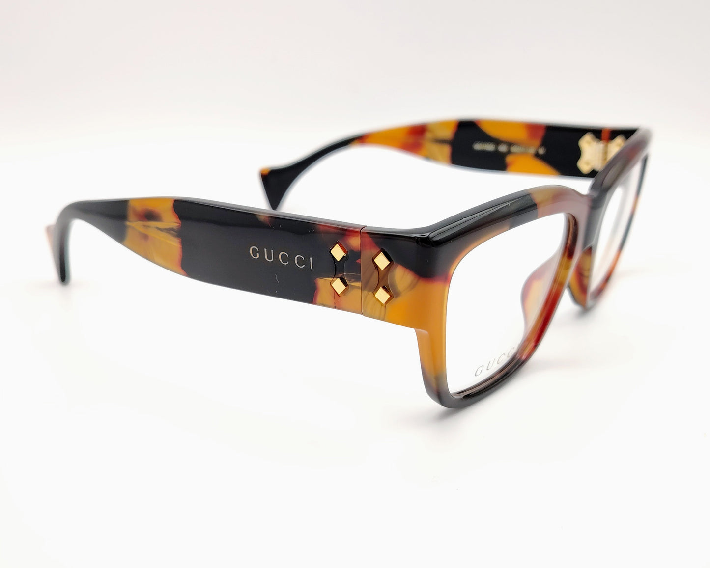 gafas gucci gg1705o 002 montura rectangular acetato habana con patrón especial detalles dorados y logo en las varillas
