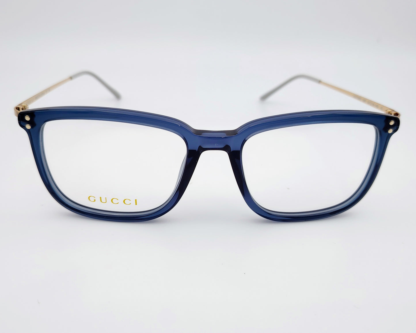gucci gg1709o 007 gafas en formato cuadrado con los bordes redondeados de acetato en azul traslúcido con las varillas en metal dorado