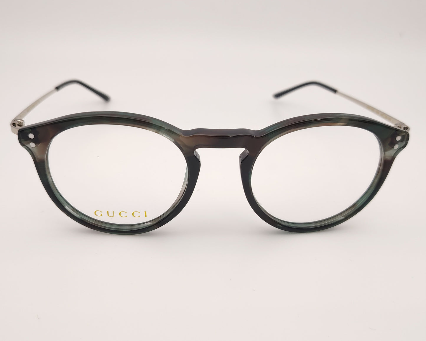 gucci gg1710o 004 gafas redondas de acetato en jaspeado verde con las varillas en metal plateado