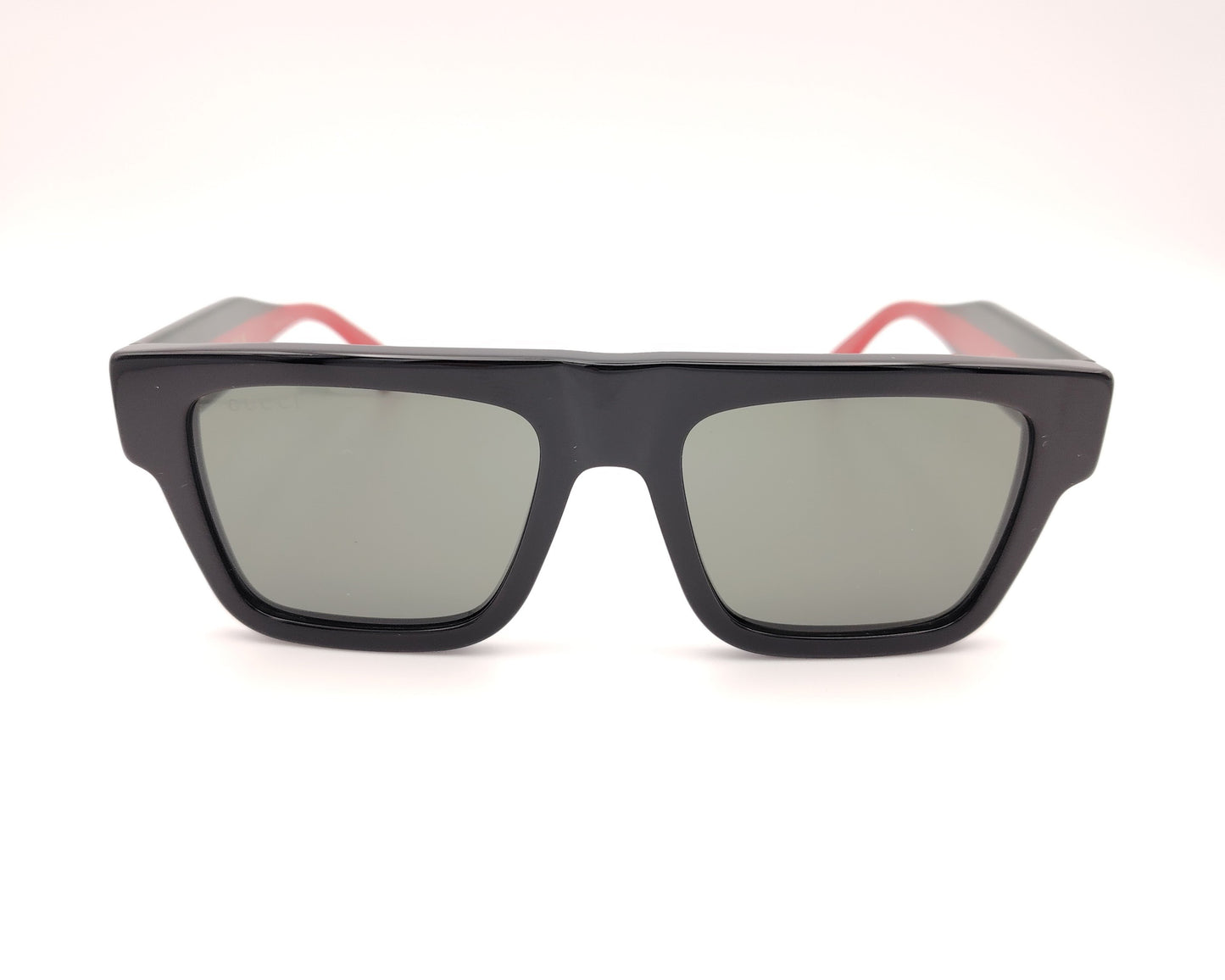 gafas de sol gucci gg1868s 001 cuadradas en acetato negro y varilla verde y roja con detalle dorado