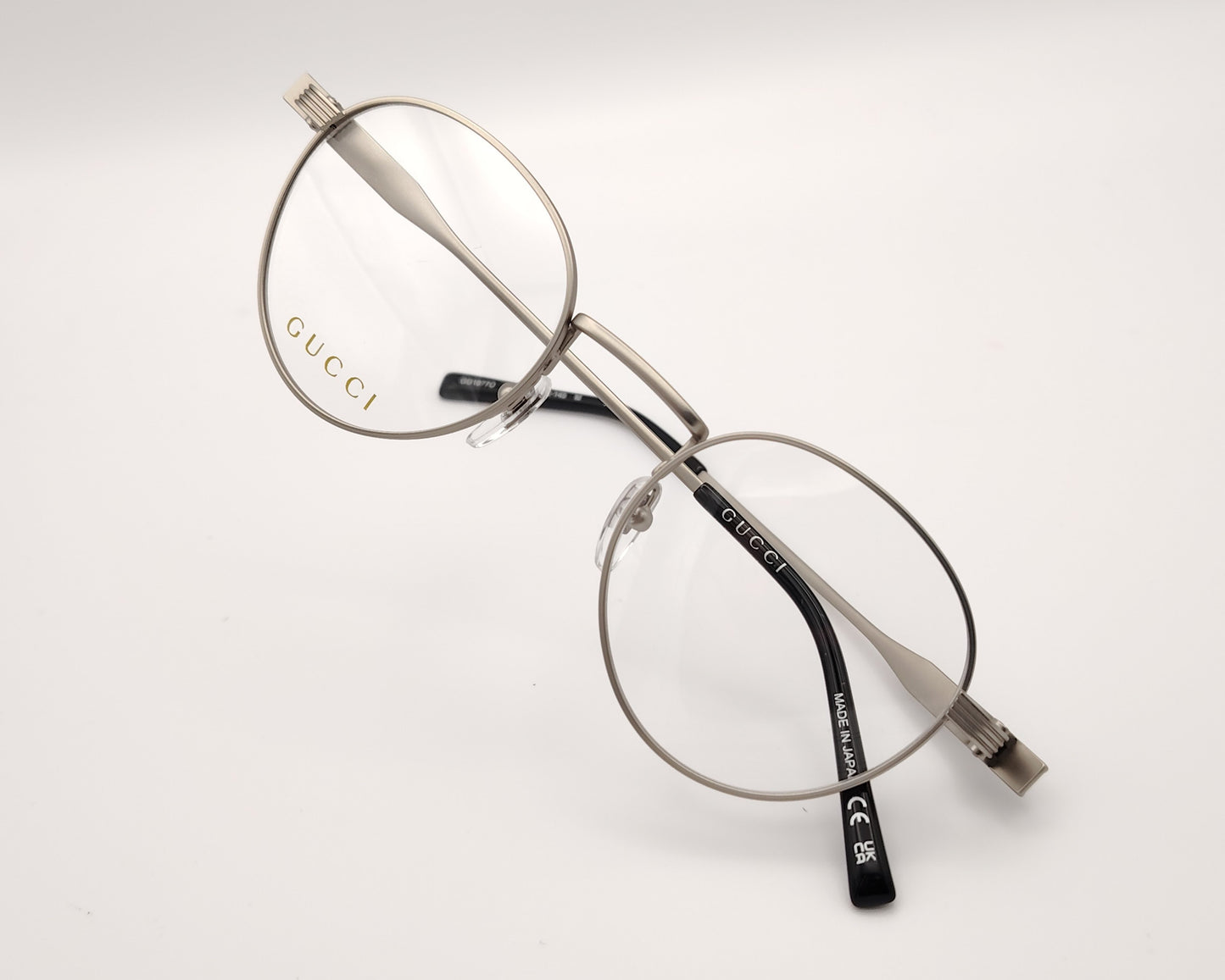 gafas gucci redondas de metal plateado mate