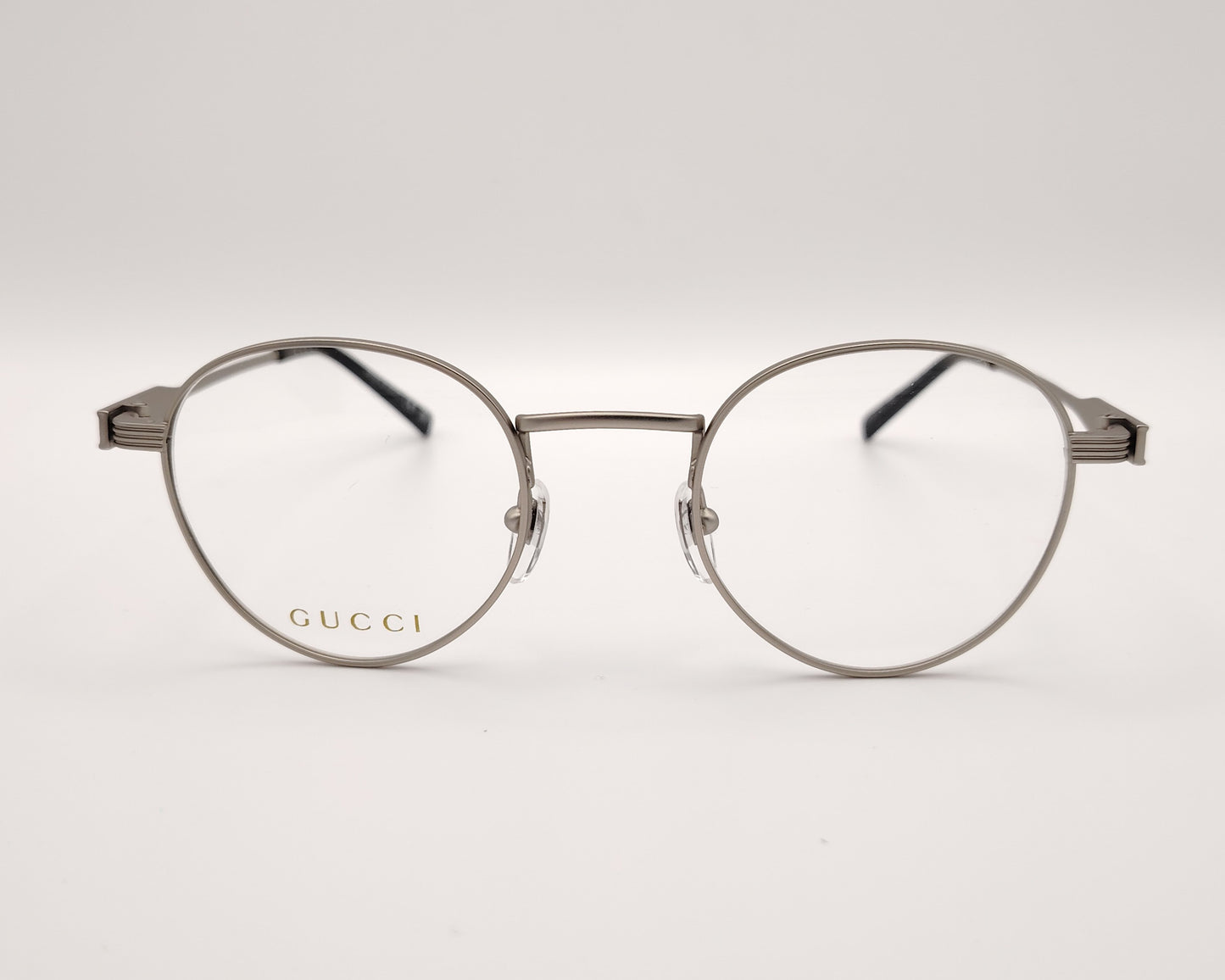 gafas gucci redondas de metal plateado mate