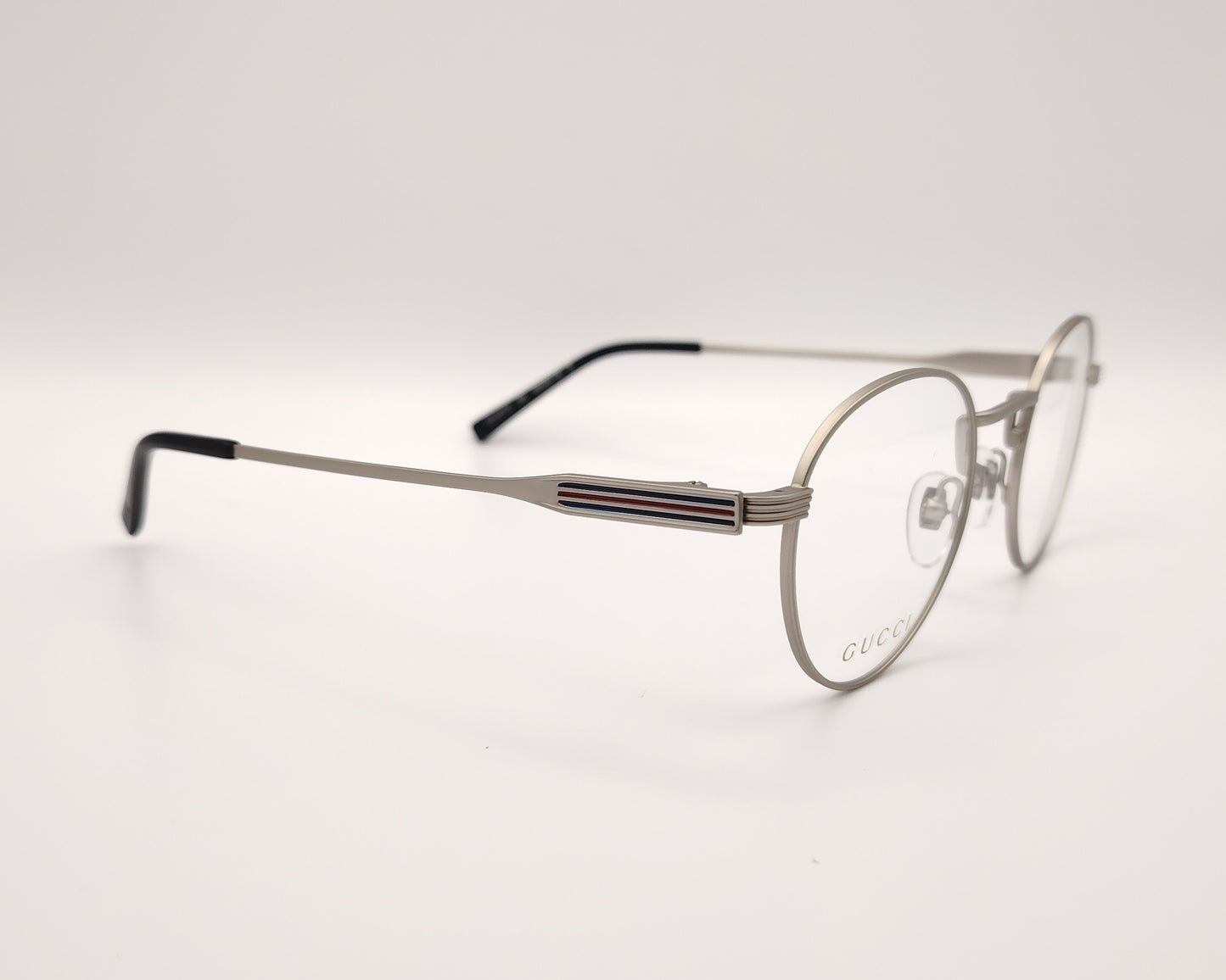 gafas gucci redondas de metal plateado mate