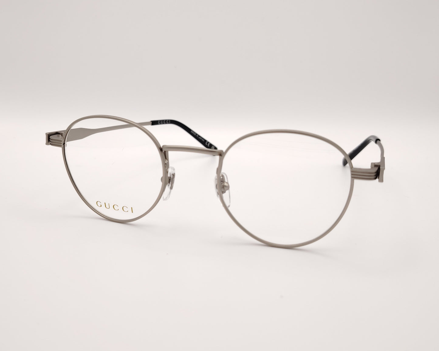 gafas gucci redondas de metal plateado mate