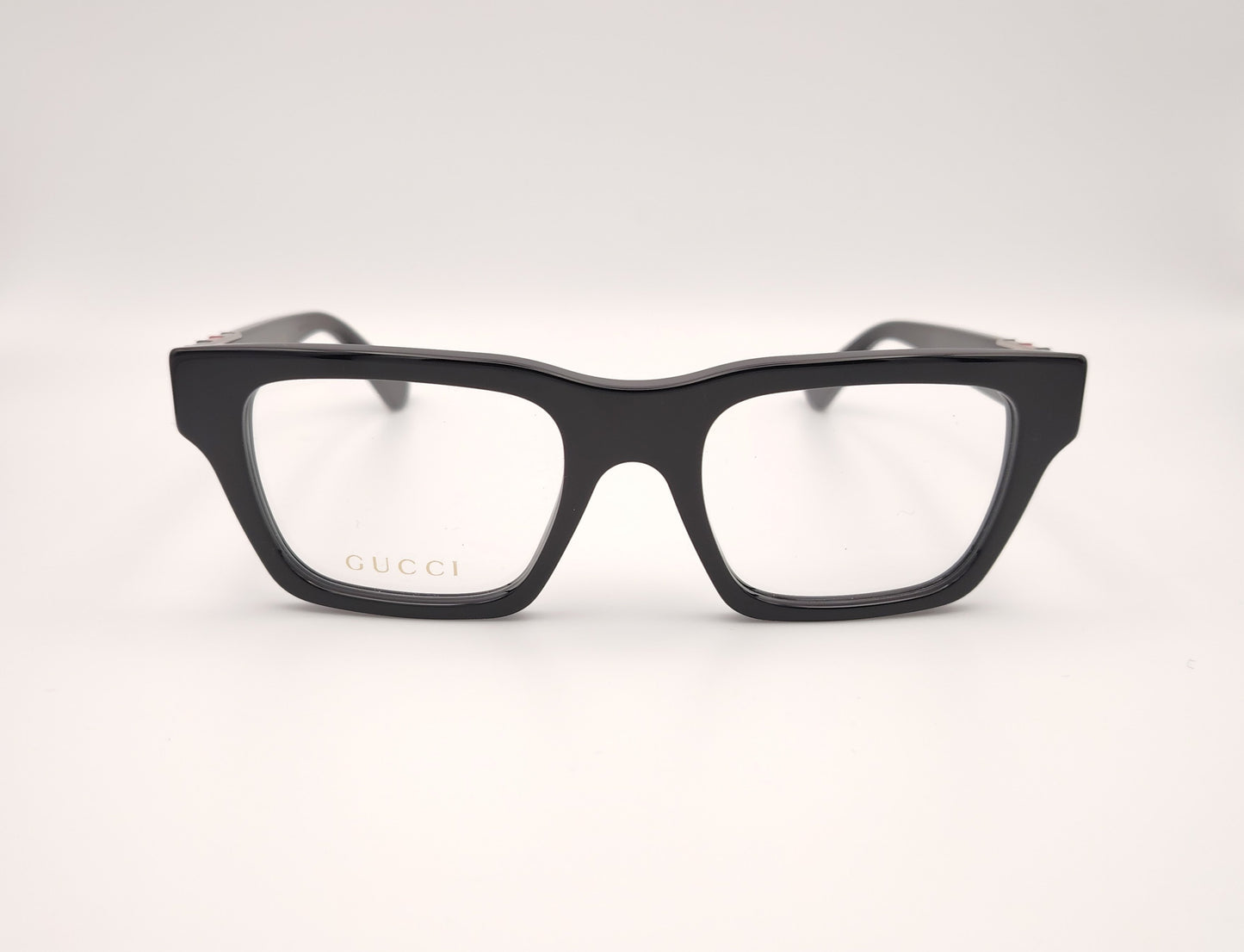 gafas gucci gg1889o 001 rectangulares en acetato negro con detalle metálico en varilla