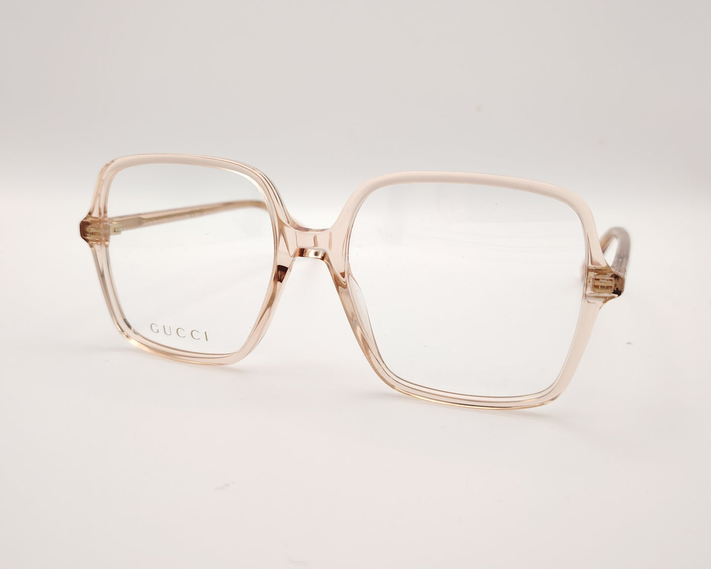 gafas graduadas de oversize con montura cuadrada en tono rosa claro translúcido