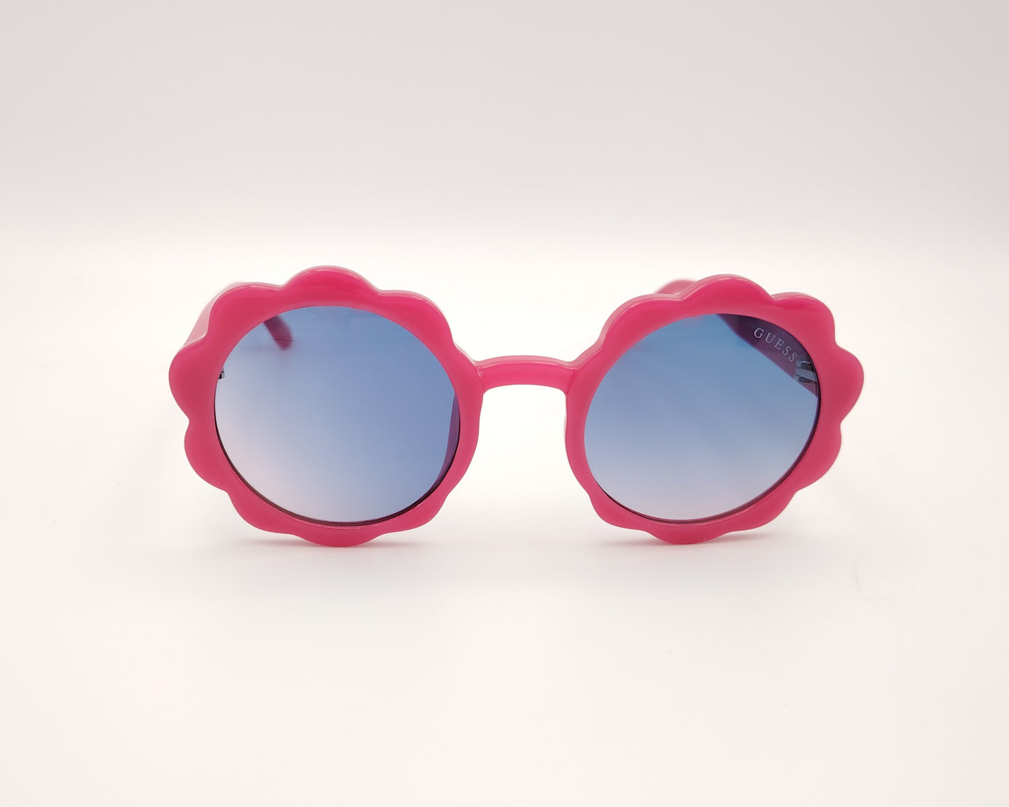 gafas de sol para niña guess gu00127 72z en forma de flor montura de pasta rosa con lentes degradadas en azul estilo divertido y juvenil