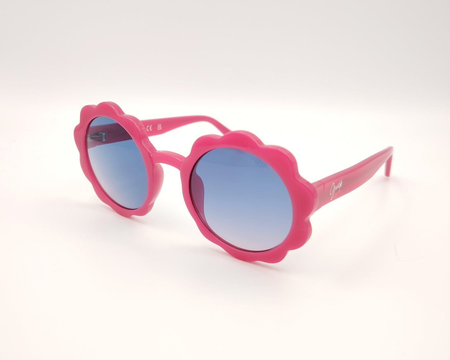 gafas de sol para niña guess gu00127 72z en forma de flor montura de pasta rosa con lentes degradadas en azul estilo divertido y juvenil