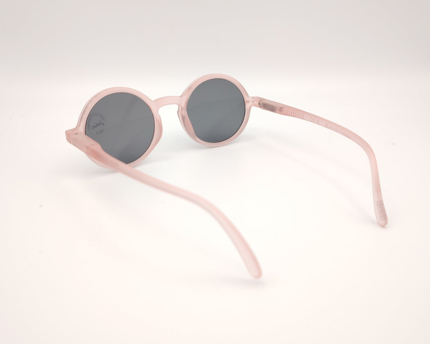 gafas de sol para niños izipizi de pasta redondas en color rosa pastel