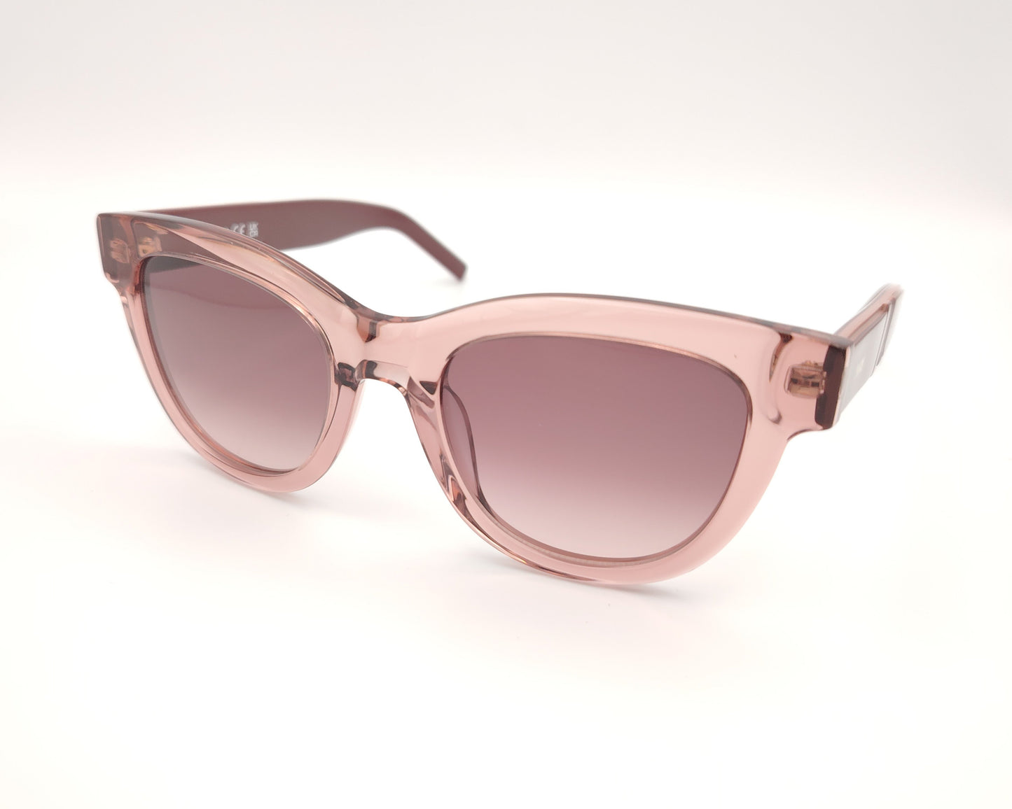 gafa de sol k-way kw0006 72z de forma cat eyes retro con montura gruesa en color rosa traslúcido y lentes degradadas en el mismo tono