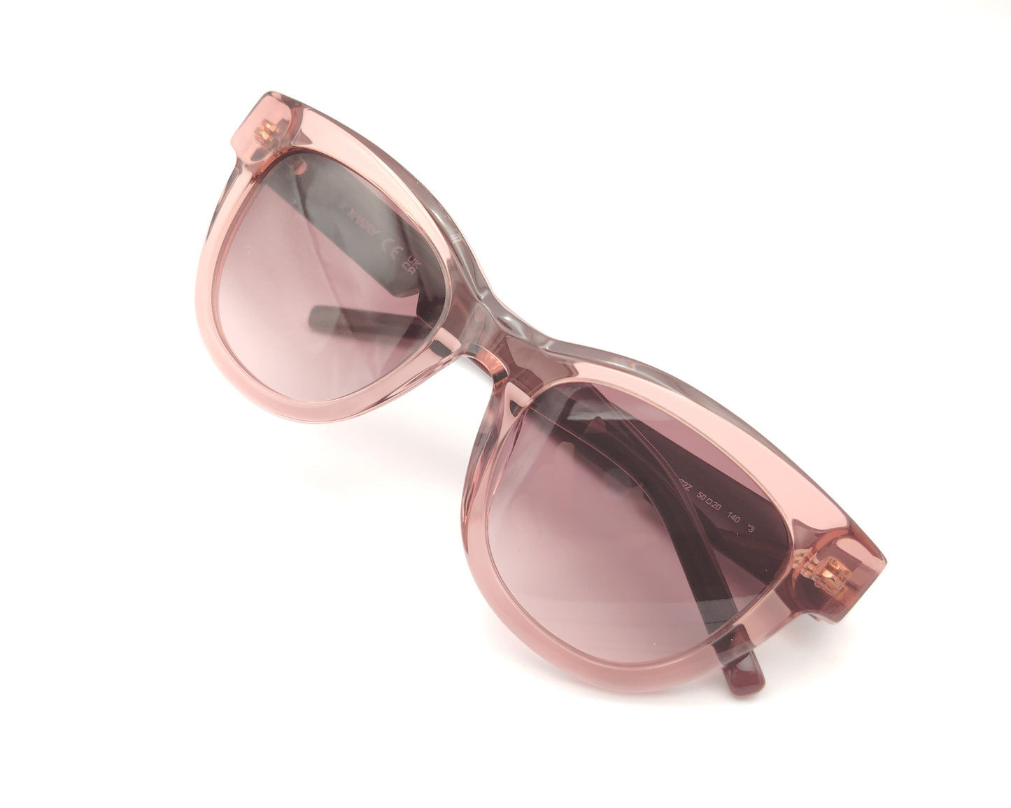 gafa de sol k-way kw0006 72z de forma cat eyes retro con montura gruesa en color rosa traslúcido y lentes degradadas en el mismo tono