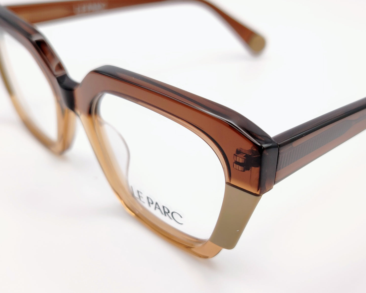 gafas le parc hayden, montura de acetato en tonos marrón y negro, diseño geométrico con bordes angulares, estilo moderno y sofisticado