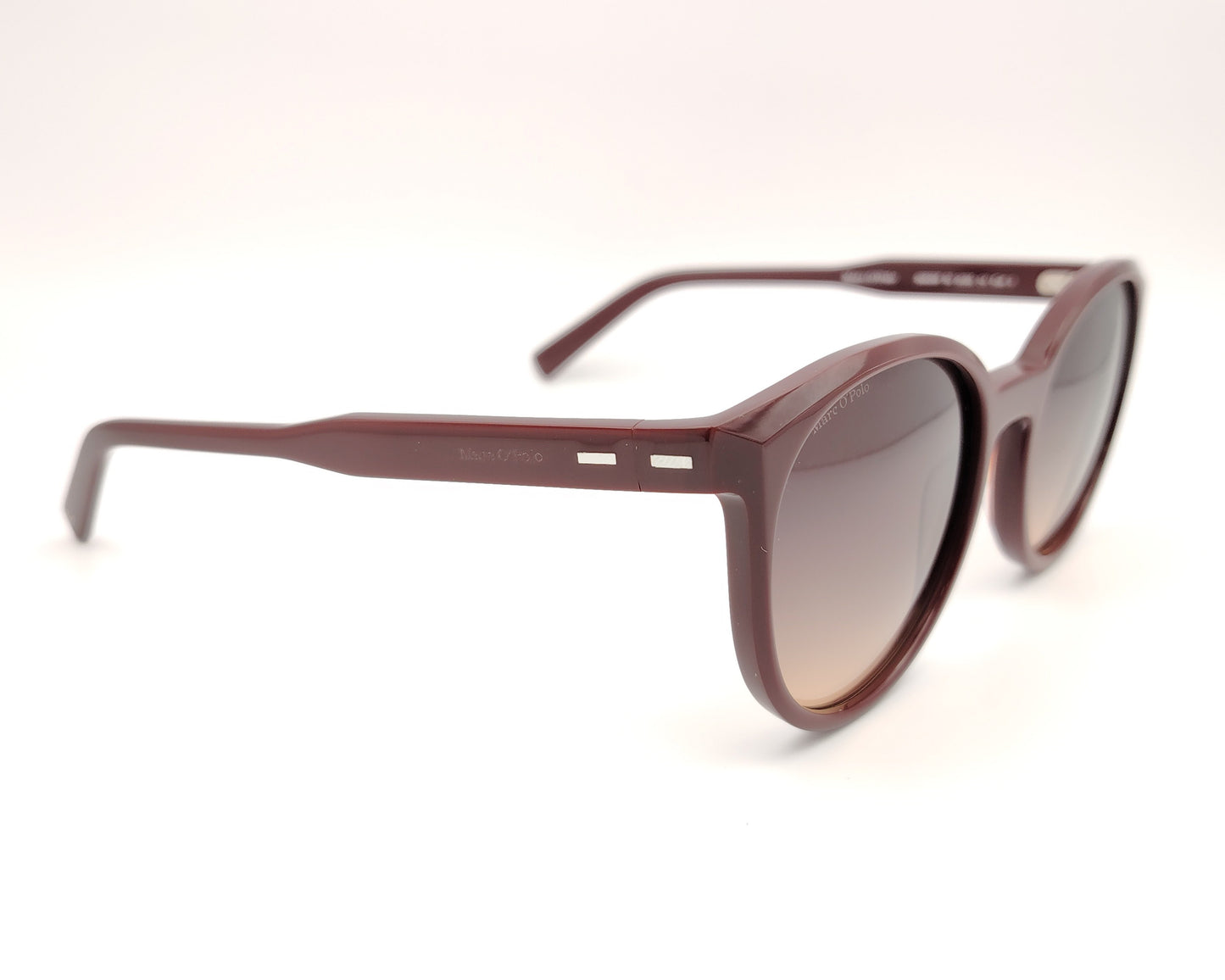 gafas de sol redondas marc o'polo 506206 50 3035 color burdeos con lentes degradadas