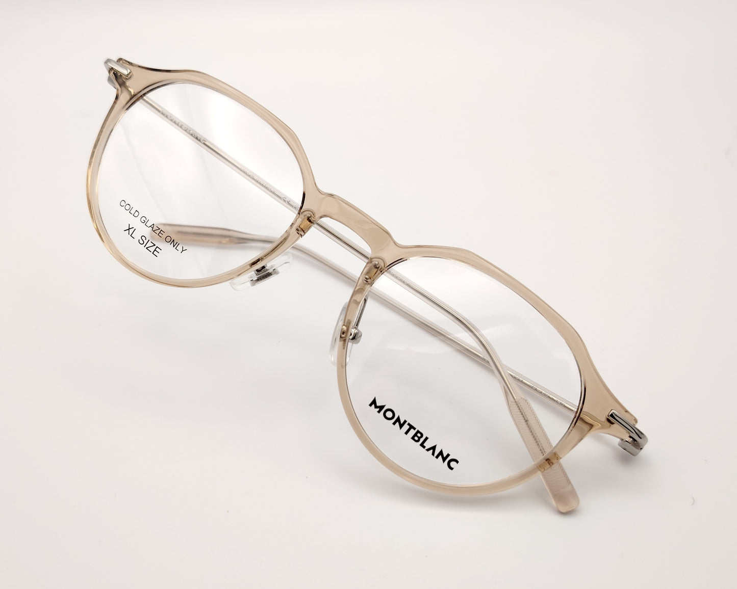 gafas montblanc redondas beige translúcidas con varillas metálicas finas
