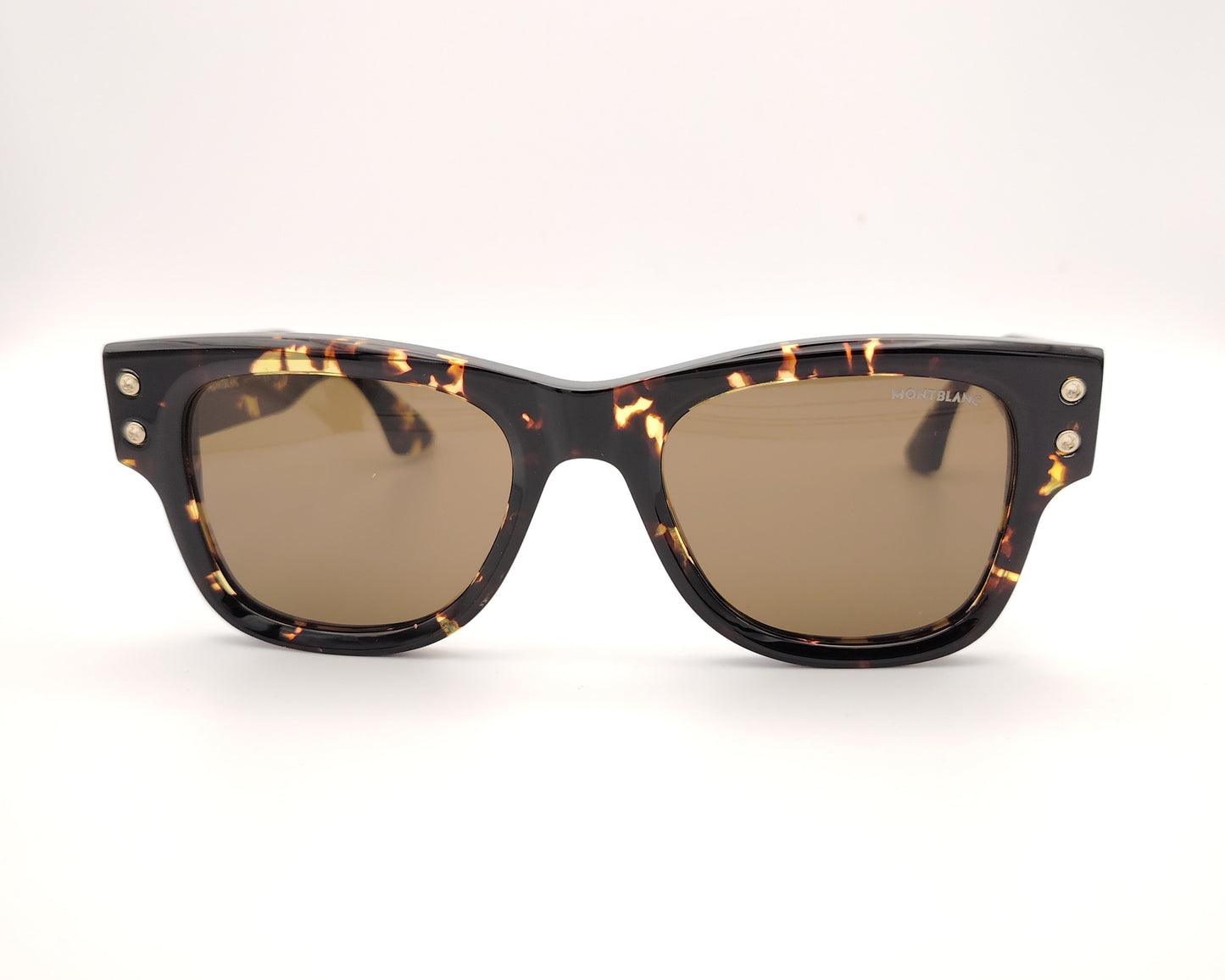 gafas de sol montblanc con montura carey gruesa y lentes marrones oscuras