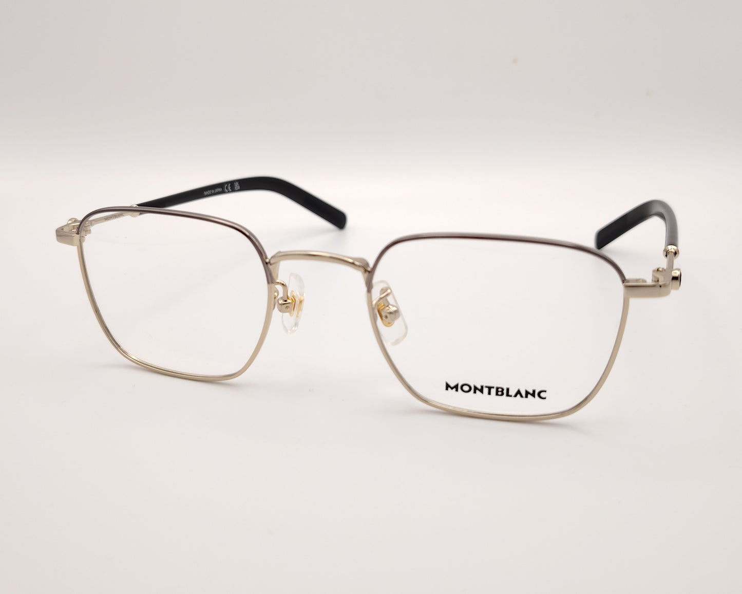 gafas montblanc con montura metálica rectangular y varillas con detalle de logo