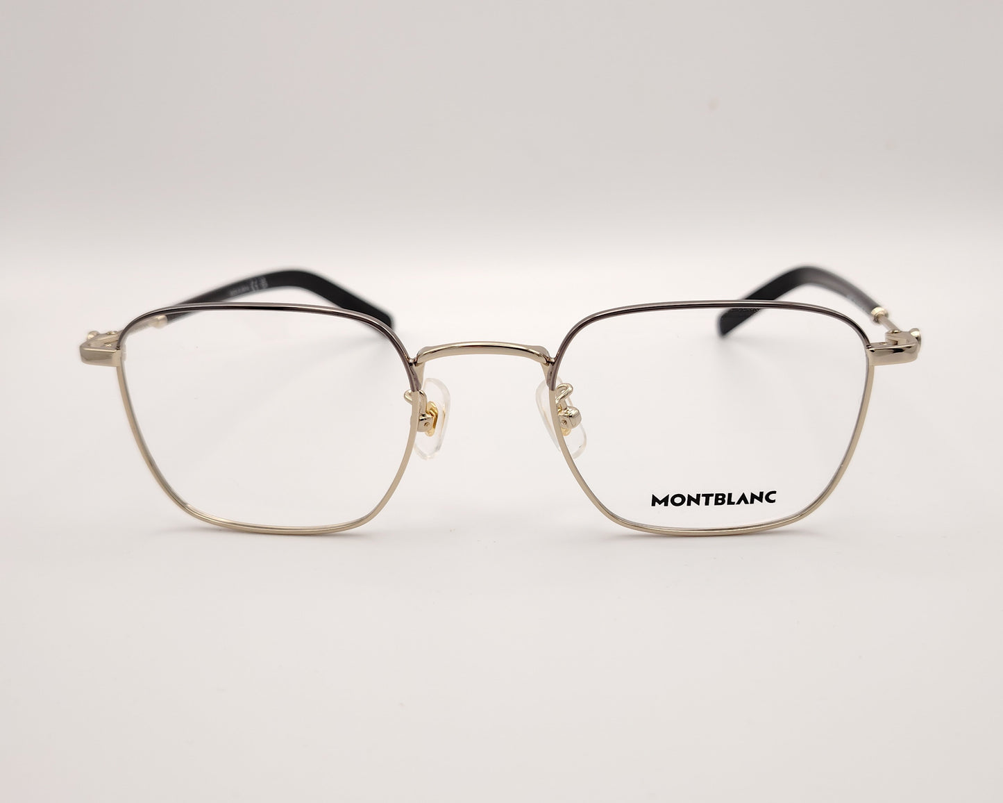 gafas montblanc con montura metálica rectangular y varillas con detalle de logo