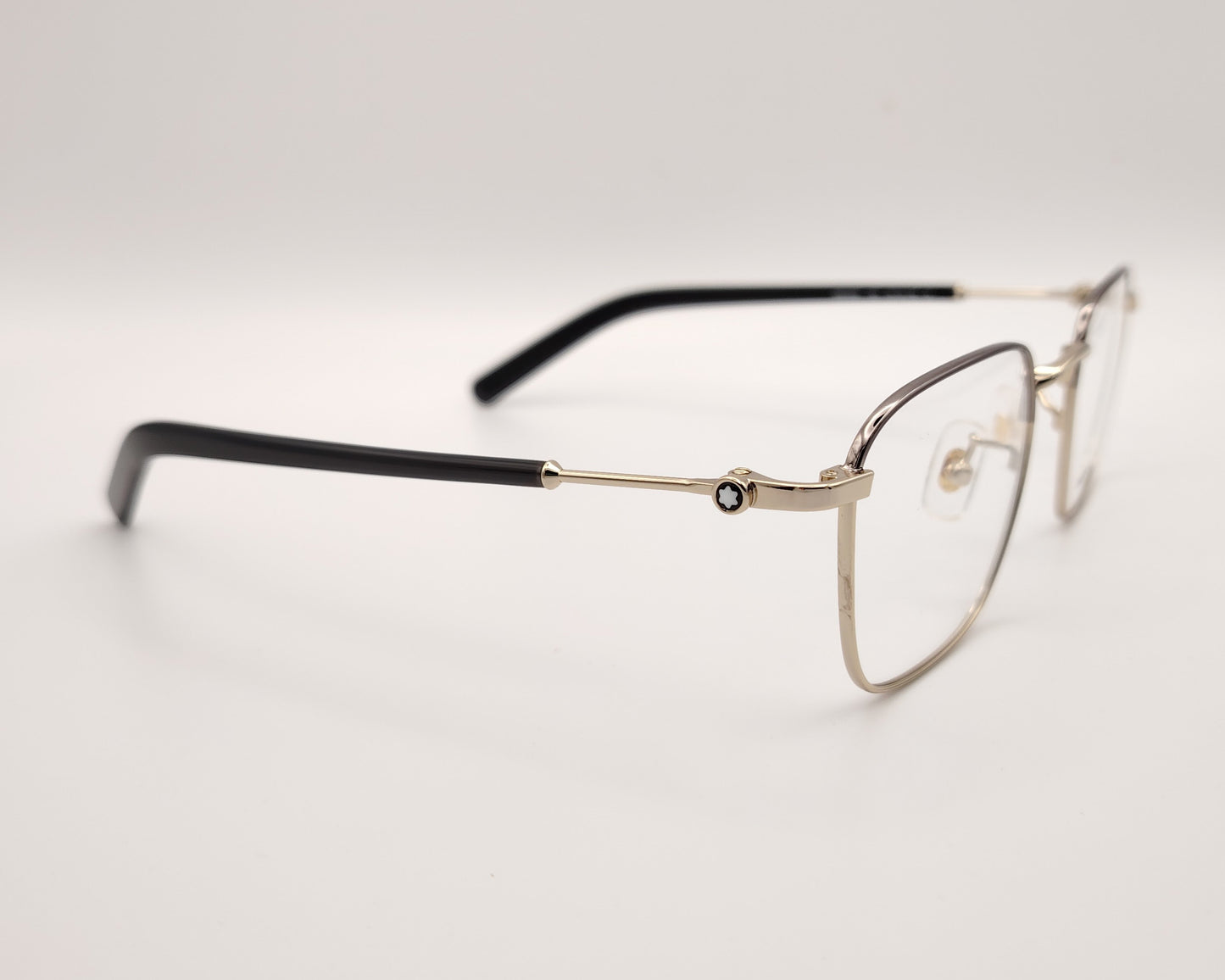 gafas montblanc con montura metálica rectangular y varillas con detalle de logo