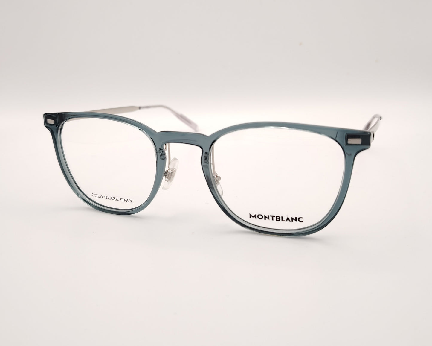 gafas montblanc con montura azul translúcida rectangular y varillas metálicas en plata