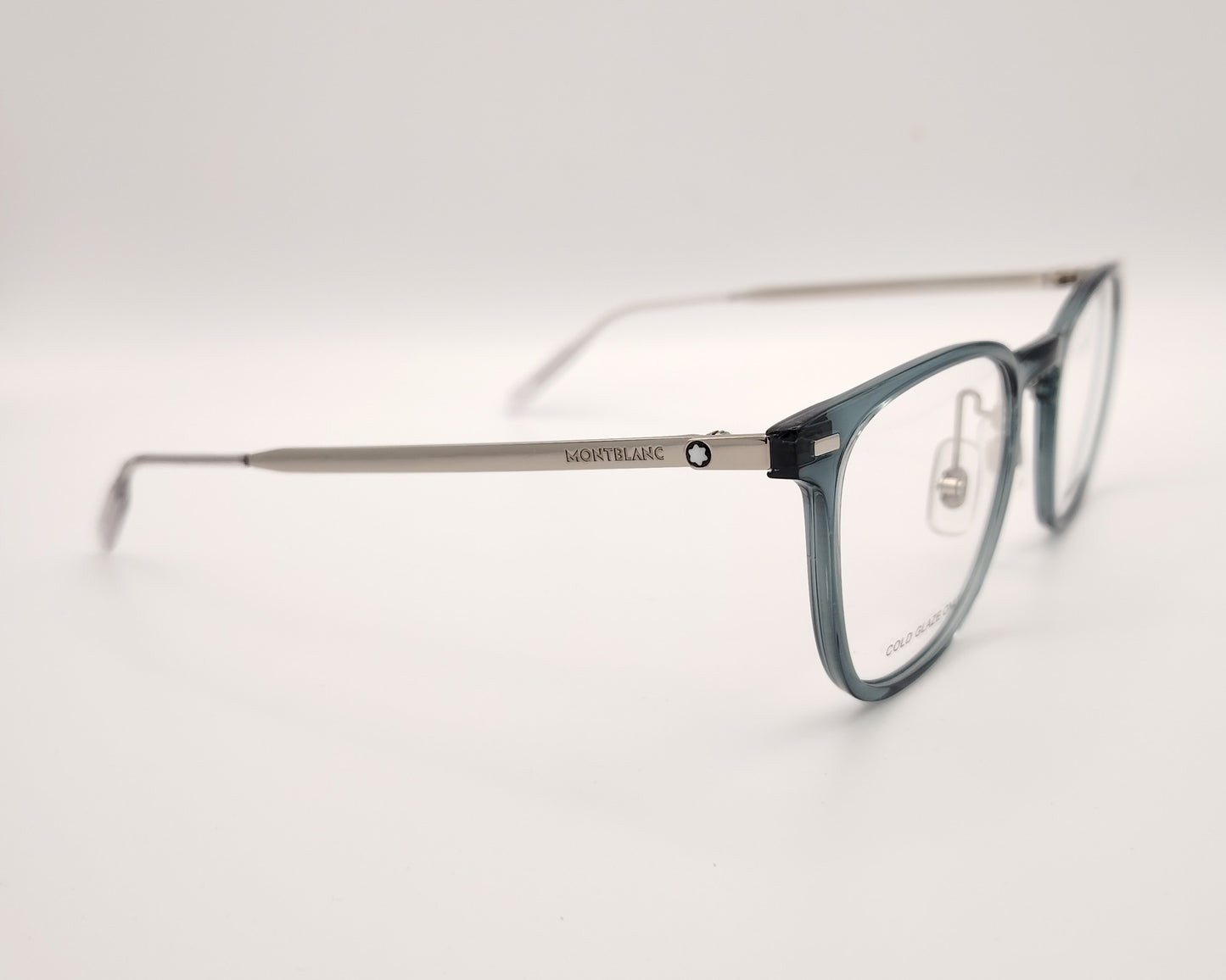 gafas montblanc con montura azul translúcida rectangular y varillas metálicas en plata