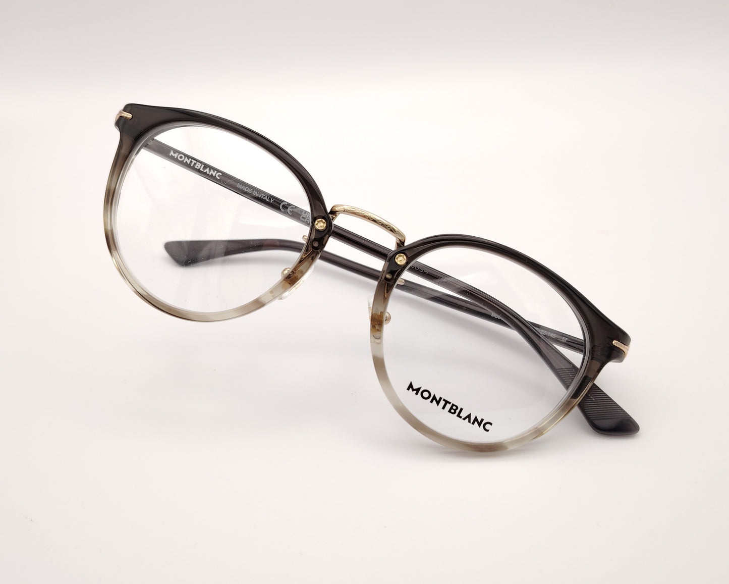 gafas montblanc redondas de acetato con montura degradada en gris oscuro y transparente