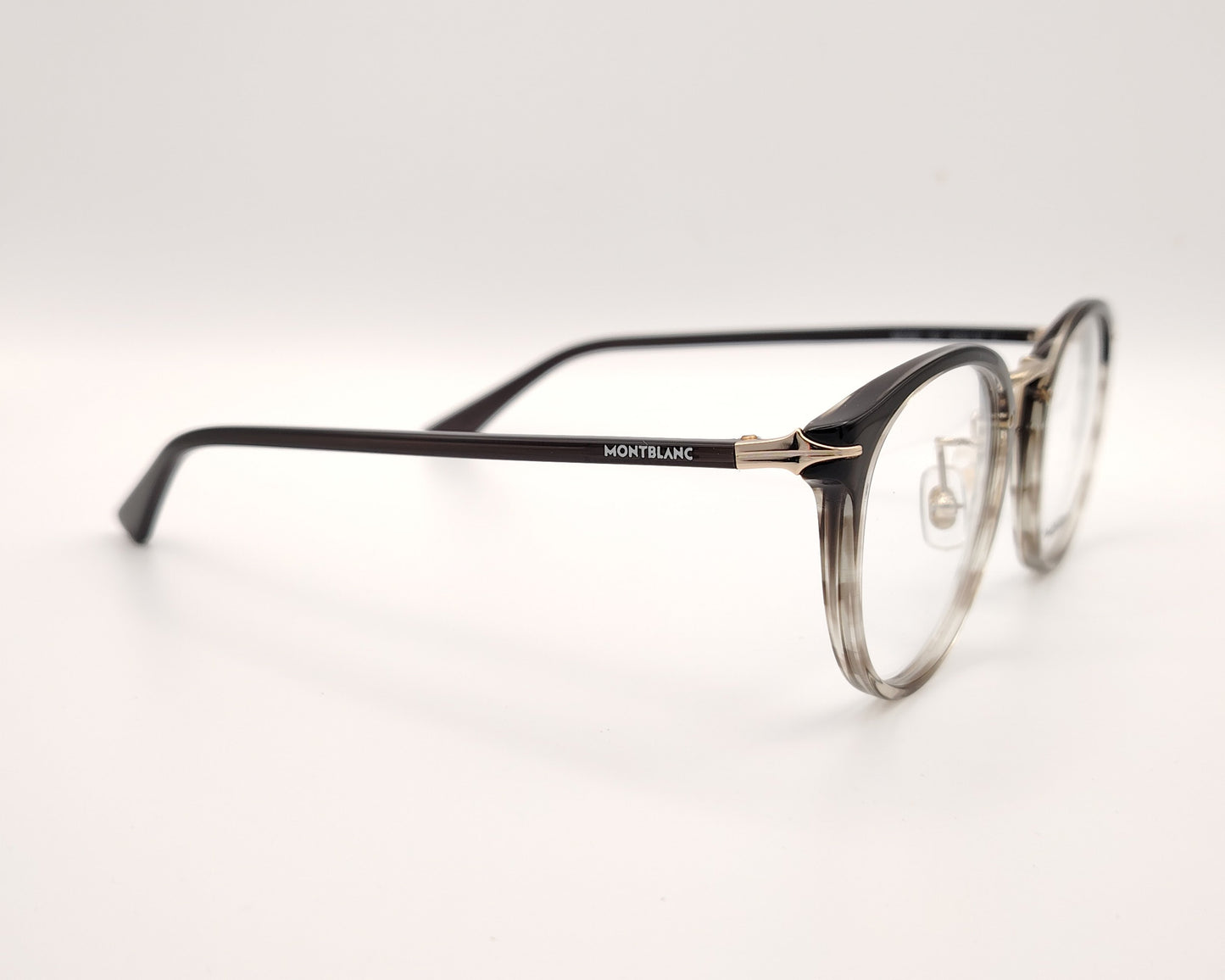 gafas montblanc redondas de acetato con montura degradada en gris oscuro y transparente