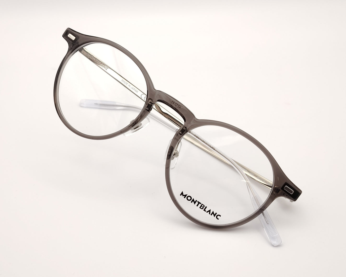 gafas montblanc redondas con frontal gris transparente y varillas metálicas finas