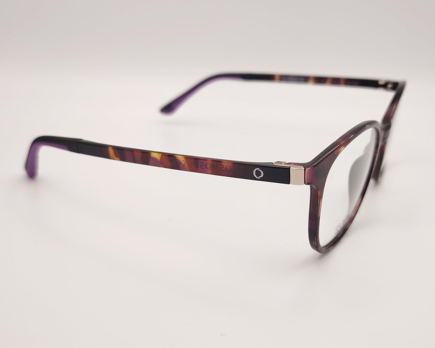 gafas osmose ocp510 c1 montura en formato redondeado en carey con detalles púrpura dos clips lentes de sol polarizadas y amarillo luminal