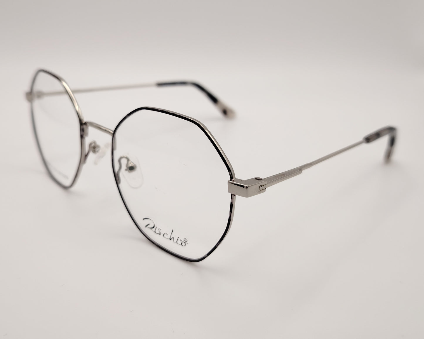 rischio r26086 c11 gafas de vista con montura metálica octogonal en color plateado con lacado jaspeado gris en
el frente, varillas finas y plaquetas ajustables diseño ligero y moderno