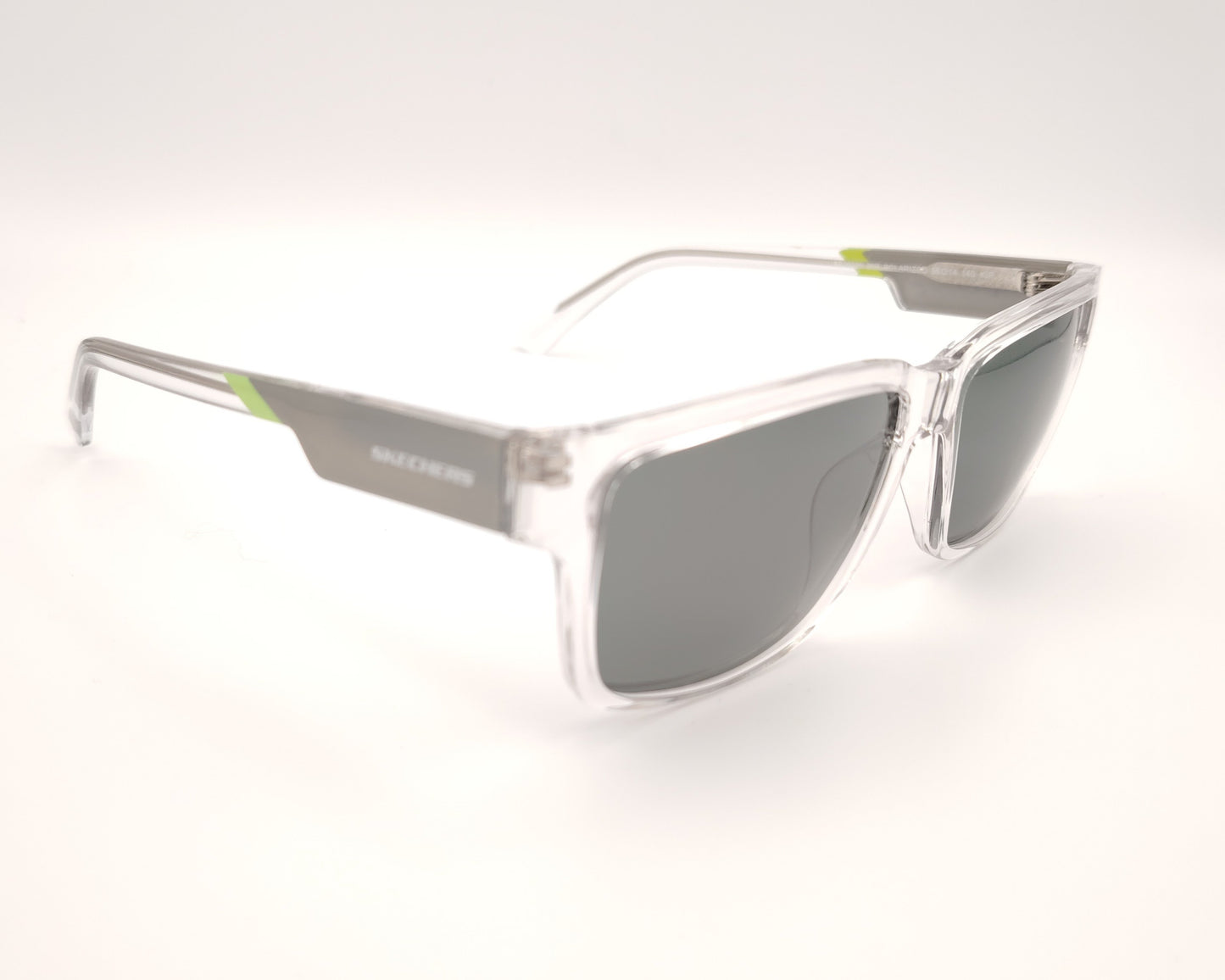 gafas de sol skechers se00025 26r con montura de pasta transparente y detalles en verde en las varillas
