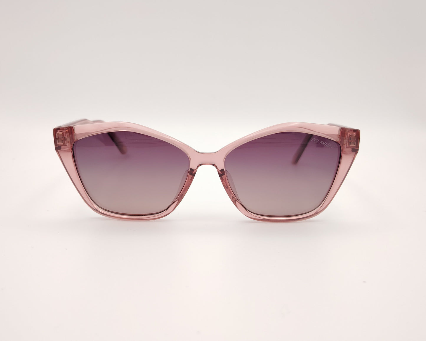 gafas de sol skechers se00035 72h con montura rosa transparente forma cat eye y lentes moradas degradadas polarizadas