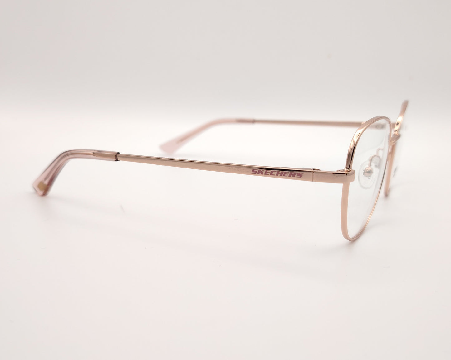gafas graduadas infantiles skechers metalizadas rosa claro con forma redondeada