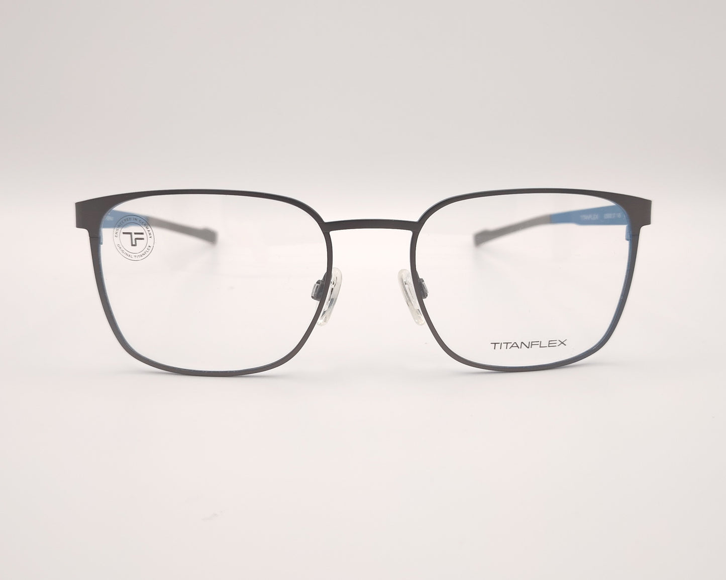 gafas titanflex gris mate con interior azul y forma ligeramente redondeada