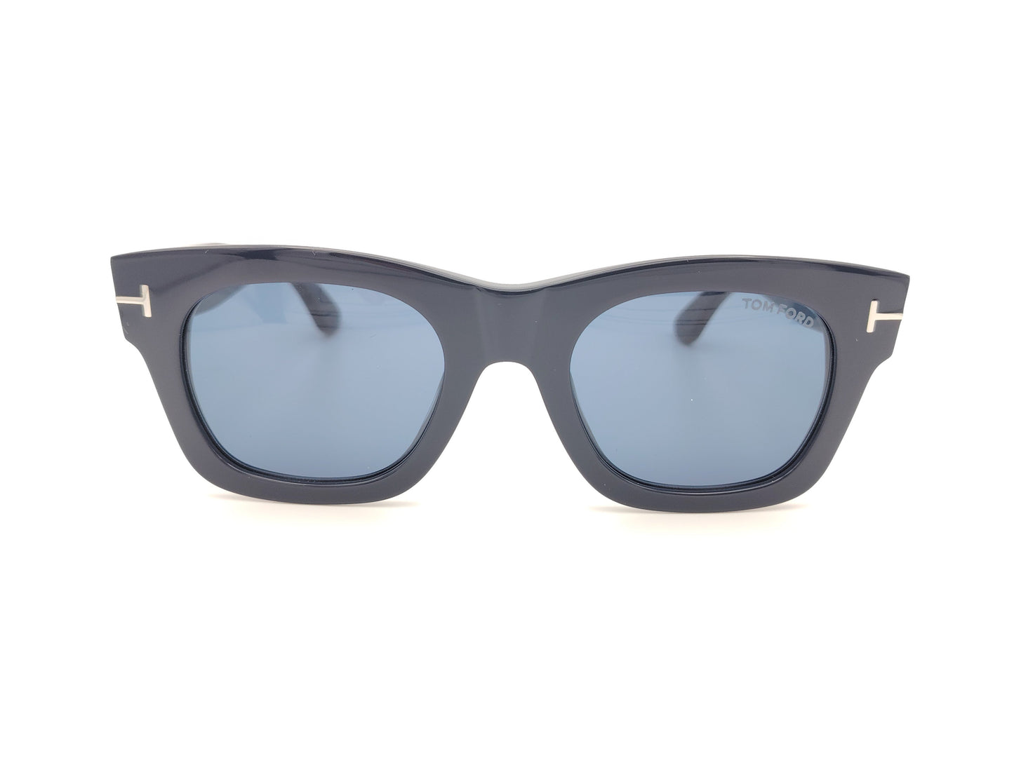 gafas de sol tom ford azul marino con lentes azules y detalle metálico en las varillas