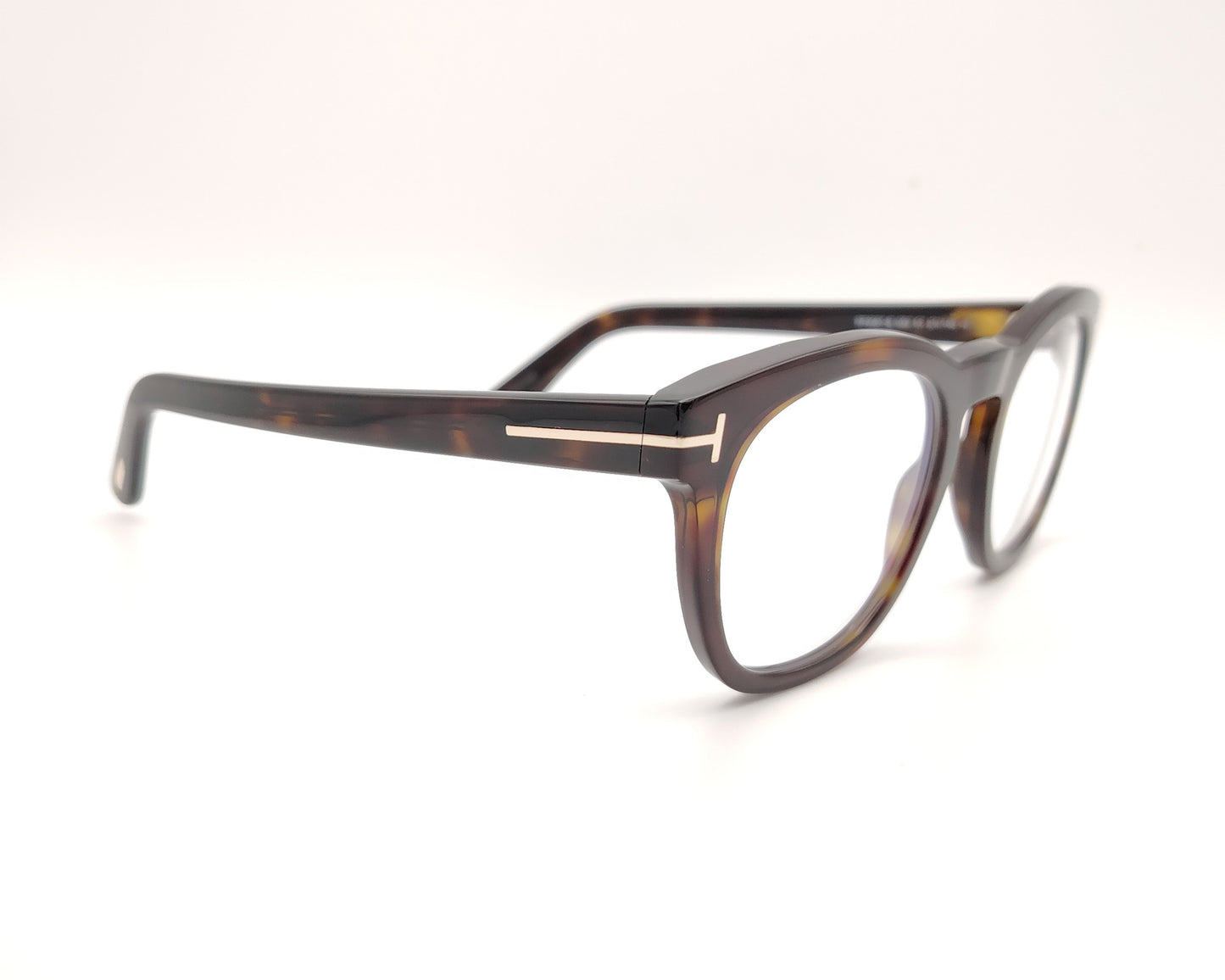 gafas redondas color carey con montura de pasta y detalle metálico lateral
